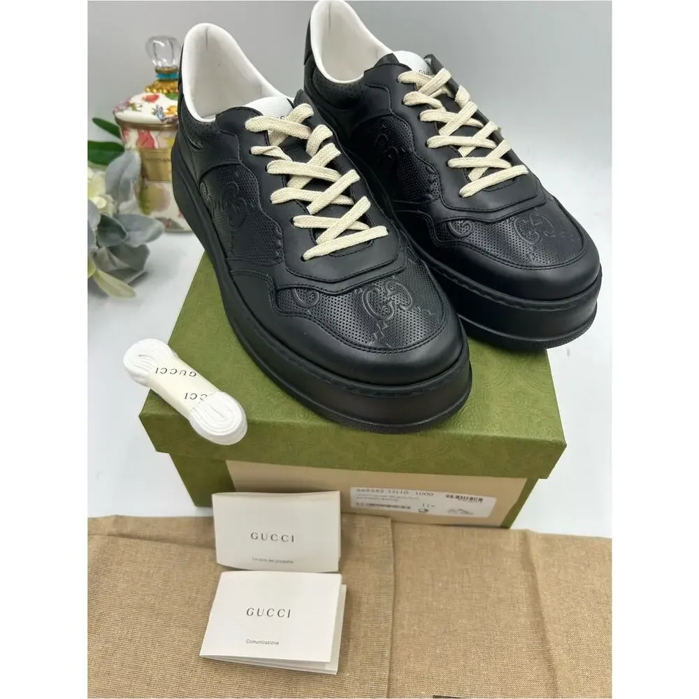 Men's Gucci, GG embossed leather sneakers size 11.5 fits 12 US made in Italy
